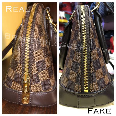 how to spot fake multicolor louis vuitton alma|false louis vuitton handbags.